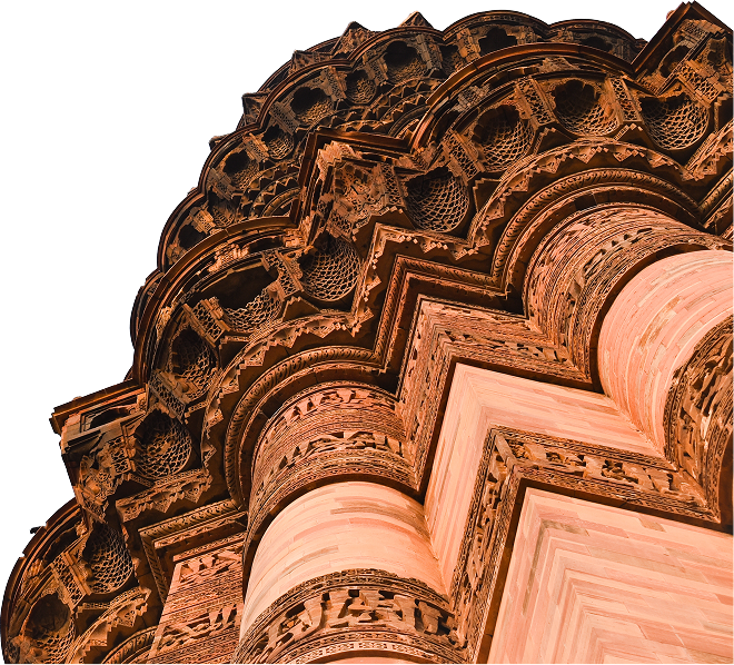 Low-angle view of Qutub Minar, a historic Indian monument